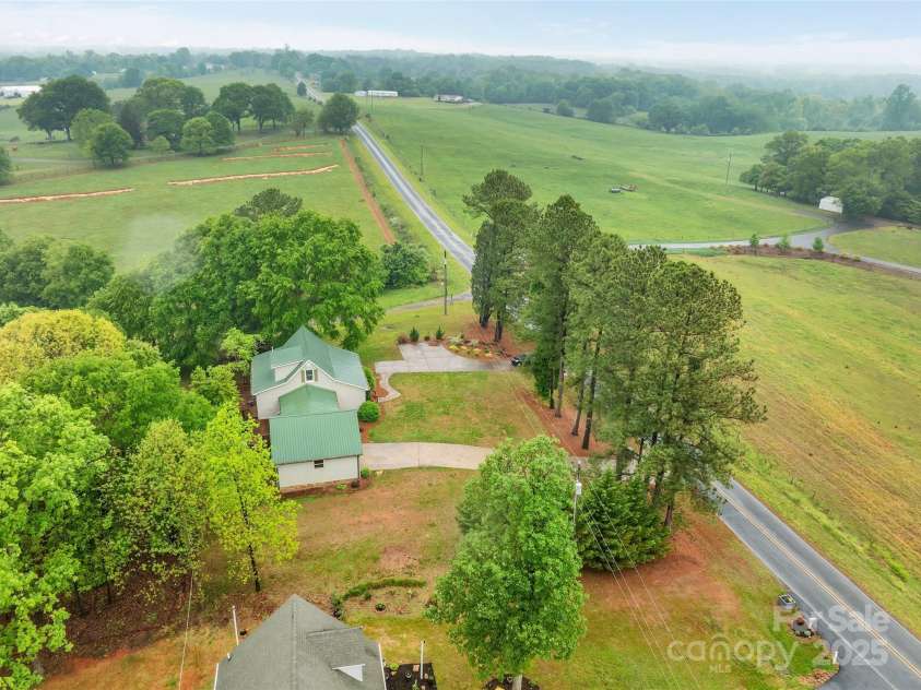 450 Lemmons Road, Mooresboro, NC 28114.  MLS# CAR4248838, YatesRealty ID 19504. Your private country retreat awaits!