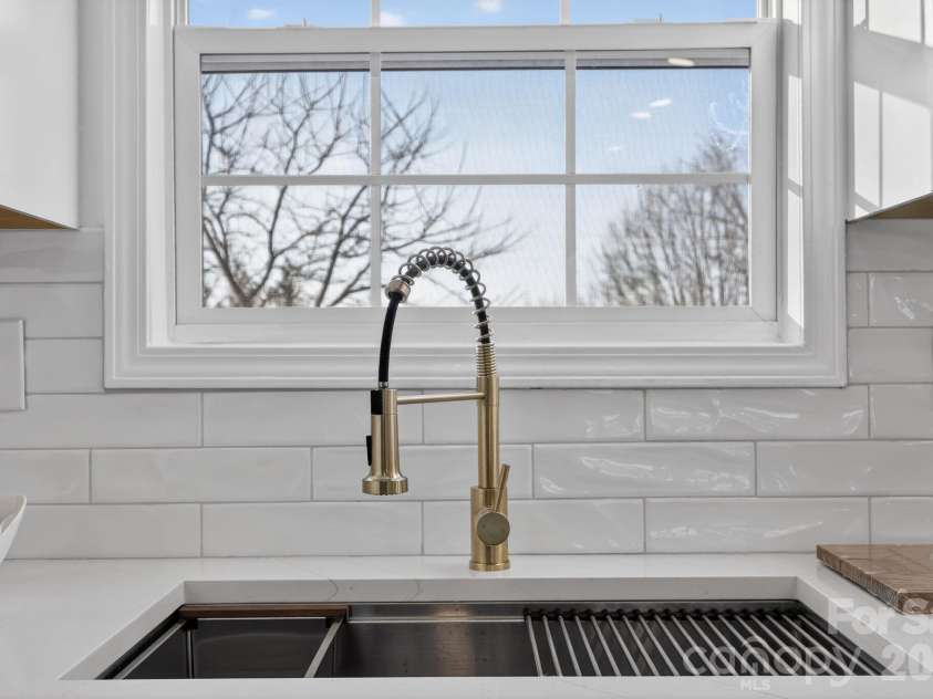 656 Wagner Street, Troutman, NC 28166.  MLS# CAR4327189, YatesRealty ID 19505. Kitchen window facing backyard.
