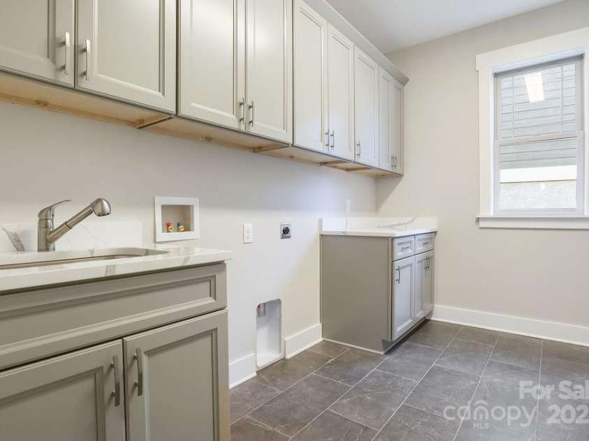 175 Waightstill Drive, Arden, NC 28704.  MLS# CAR3874338, YatesRealty ID 19507. Large Laundry Room
