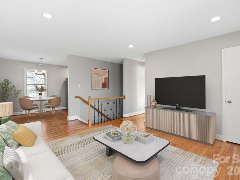 1717 Woodvalley Drive, Charlotte, NC 28216.  MLS# CAR4342546, YatesRealty ID 19511. Virtually staged