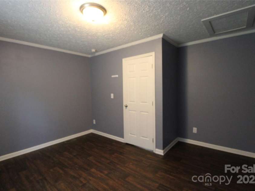 2310 Alfred Hartley Road, Lenoir, NC 28645.  MLS# CAR4258802, YatesRealty ID 19511. Bedroom #2 with attic access