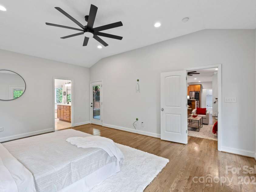21 Hope Road, Weaverville, NC 28787.  MLS# CAR4261300, YatesRealty ID 19512. Primary Bedroom toward bathroom & sunroom
