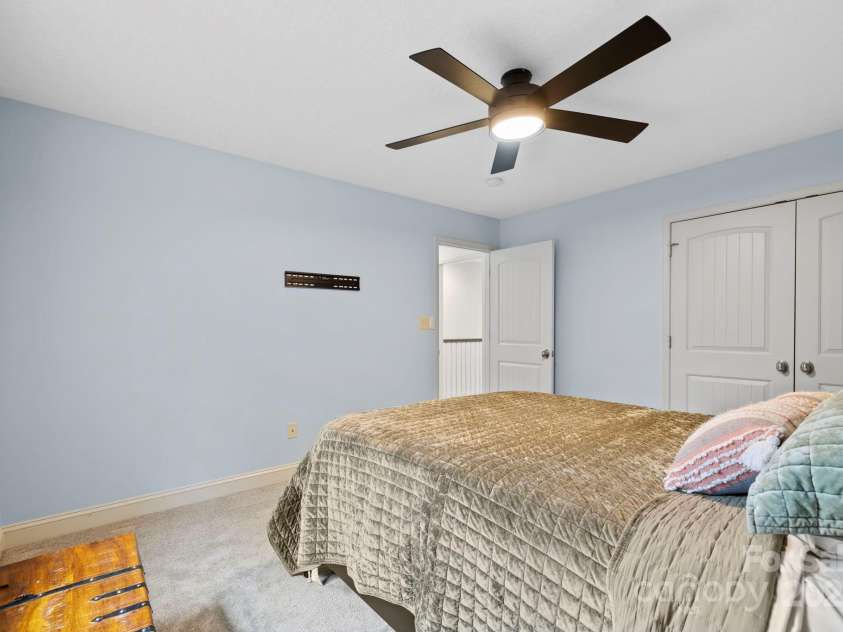 21 Hope Road, Weaverville, NC 28787.  MLS# CAR4261300, YatesRealty ID 19512. Secondary Bedroom toward doorway