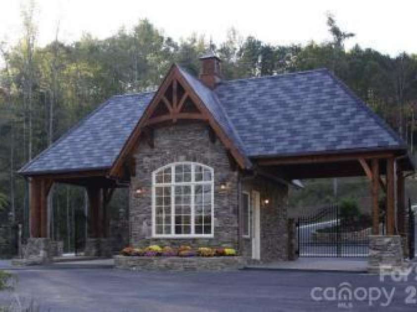 234 Crest Drive, Lake Lure, NC 28746.  MLS# CAR4379273, YatesRealty ID 19517. Gate House