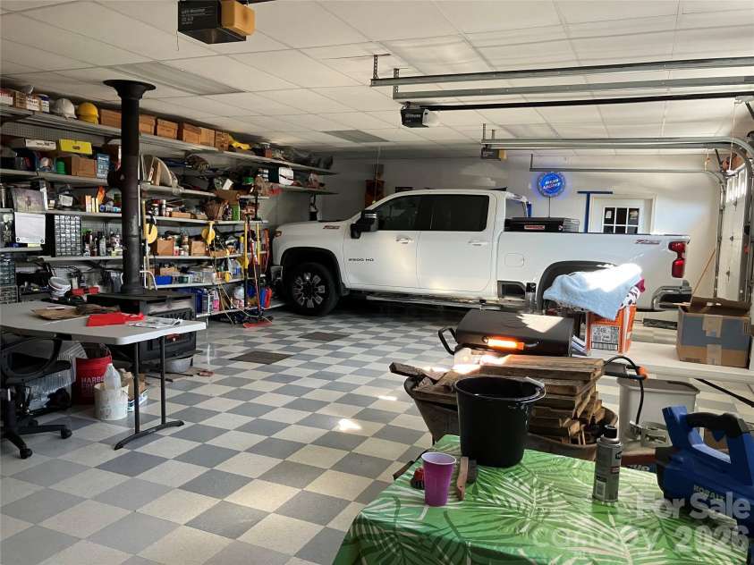 13215 Pine Bluff Road, Midland, NC 28107.  MLS# CAR4345295, YatesRealty ID 19518. Inside 3 car garage