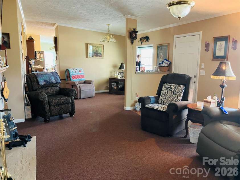 13215 Pine Bluff Road, Midland, NC 28107.  MLS# CAR4345295, YatesRealty ID 19518. Living Room