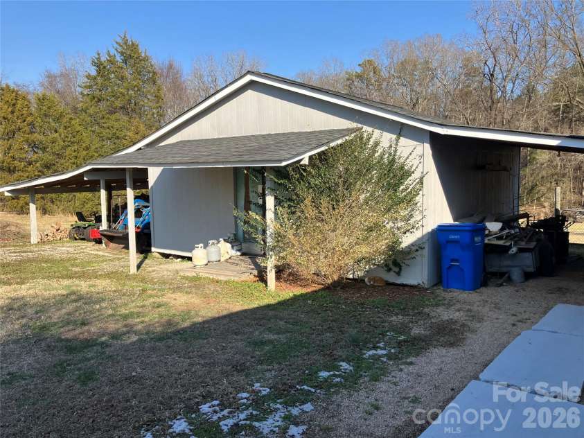 13215 Pine Bluff Road, Midland, NC 28107.  MLS# CAR4345295, YatesRealty ID 19518. Storage building
