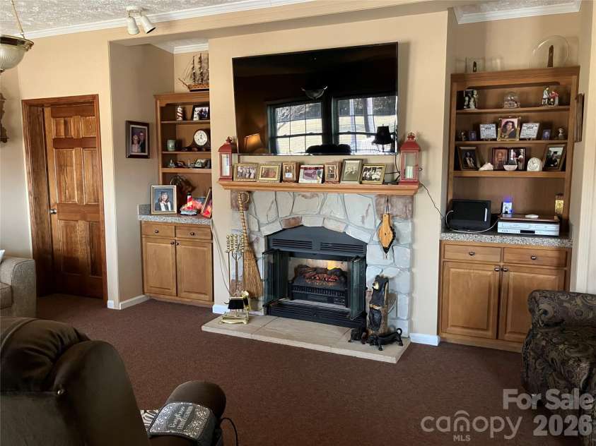 13215 Pine Bluff Road, Midland, NC 28107.  MLS# CAR4345295, YatesRealty ID 19518. Wood burning fireplace