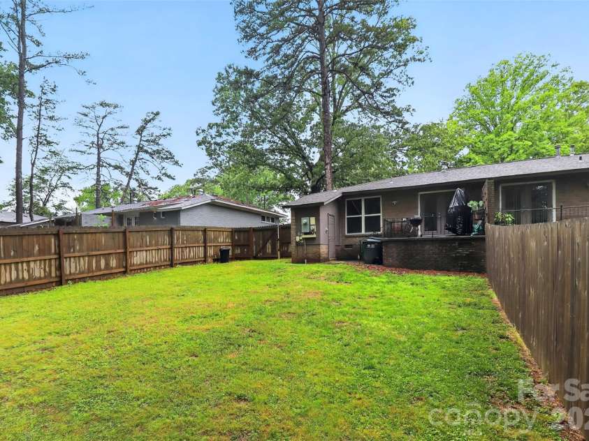 1735-1737 Herrin Avenue, Charlotte, NC 28205.  MLS# CAR4371448, YatesRealty ID 19523. Back yard 1737