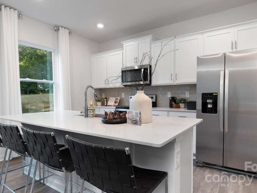 5066 Beargrass Drive, Dallas, NC 28034.  MLS# CAR4248305, YatesRealty ID 19527. Picture is Representative
