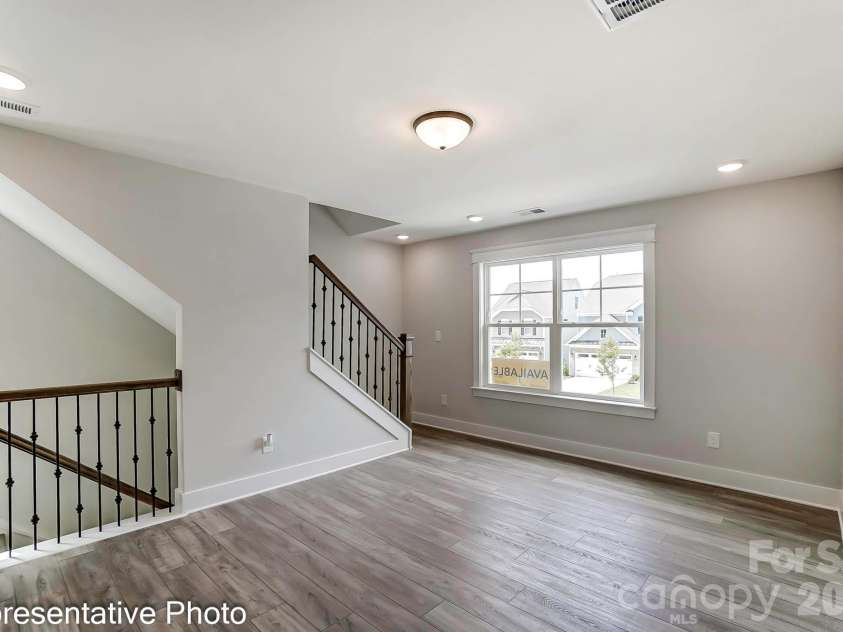 13118 Foxberry Road, Charlotte, NC 28213.  MLS# CAR4353973, YatesRealty ID 19528. Example of loft with stairs to third floor