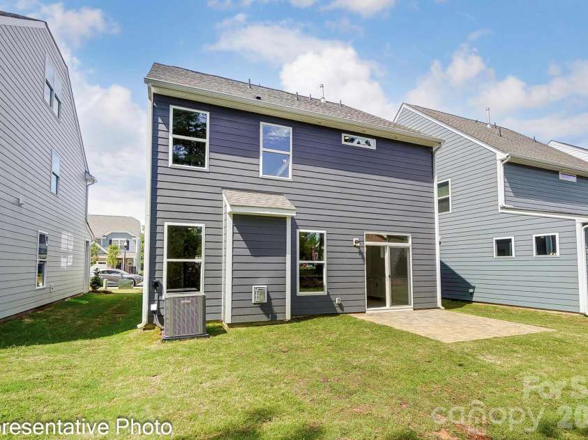 13118 Foxberry Road, Charlotte, NC 28213.  MLS# CAR4353973, YatesRealty ID 19528. Rear exterior example with a paver patio