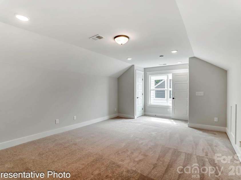 13118 Foxberry Road, Charlotte, NC 28213.  MLS# CAR4353973, YatesRealty ID 19528. Third-floor bedroom example