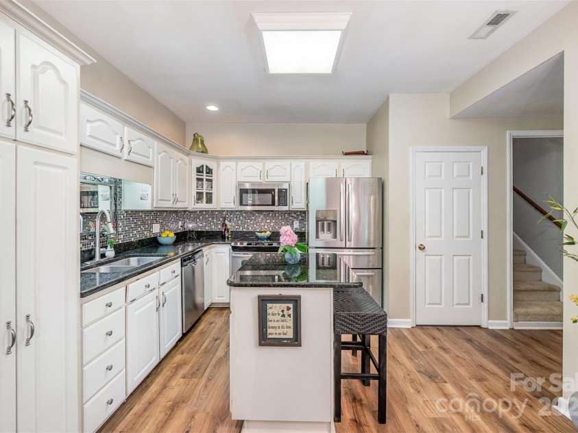5208 Black Oak Lane, Waxhaw, NC 28173.  MLS# CAR4259258, YatesRealty ID 19528. Kitchen, island is movable