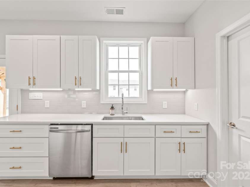 1832 Montclair Avenue, Gastonia, NC 28054.  MLS# CAR4252150, YatesRealty ID 19536. Beautiful Kitchen with tons of light coming in