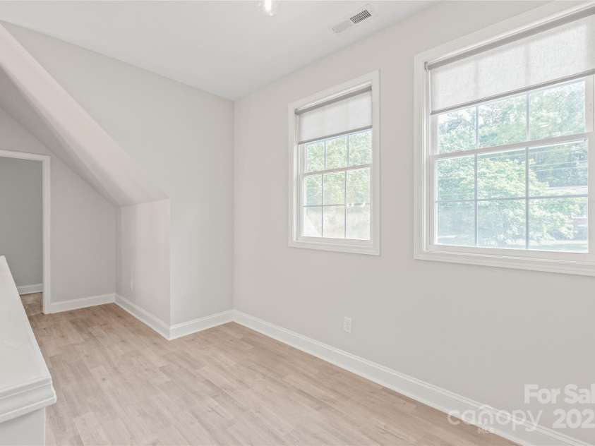 1832 Montclair Avenue, Gastonia, NC 28054.  MLS# CAR4252150, YatesRealty ID 19536. Loft at Top of Stairs