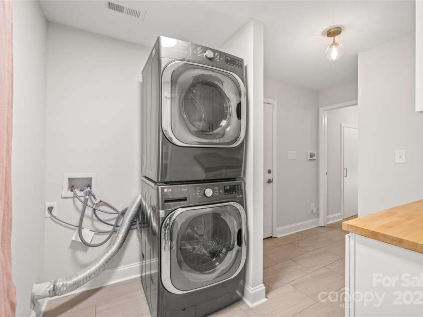 1832 Montclair Avenue, Gastonia, NC 28054.  MLS# CAR4252150, YatesRealty ID 19536. Stacked Washer and Dryer in Laundry Room