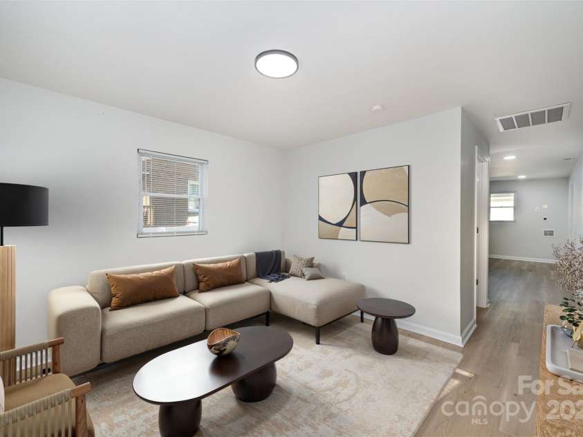 1211 Boyce Street, Gastonia, NC 28052.  MLS# CAR4253873, YatesRealty ID 19537. Living Room (virtually staged)