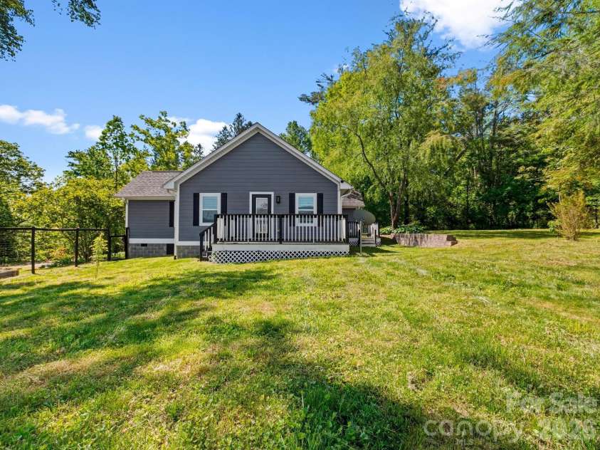 3333 Chimney Rock Road, Hendersonville, NC 28792.  MLS# CAR4349210, YatesRealty ID 19539. Back Yard 