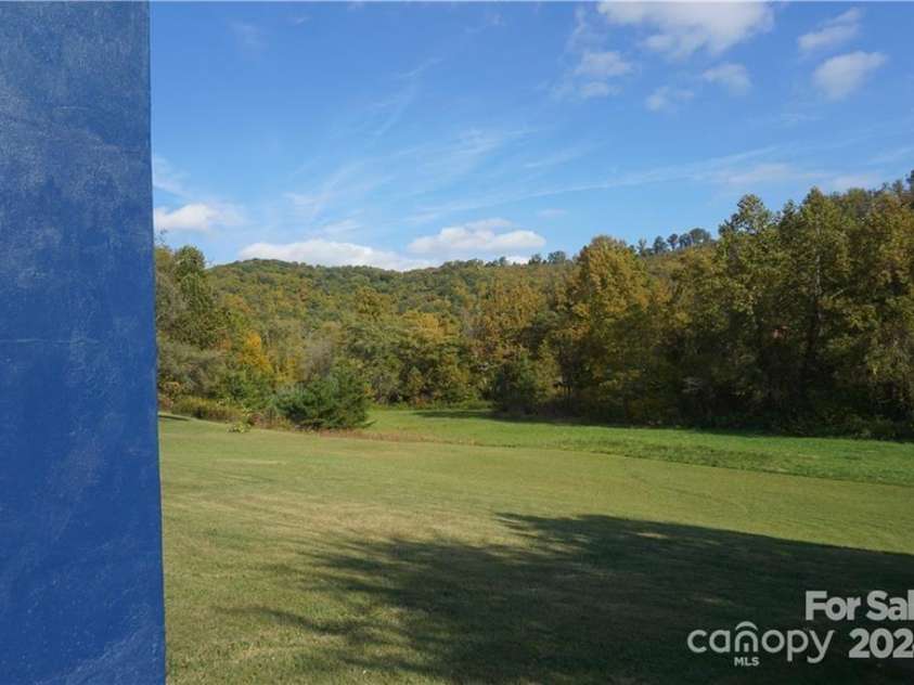 295 Merrills Cove Road, Asheville, NC 28803.  MLS# CAR4202644, YatesRealty ID 1954. 