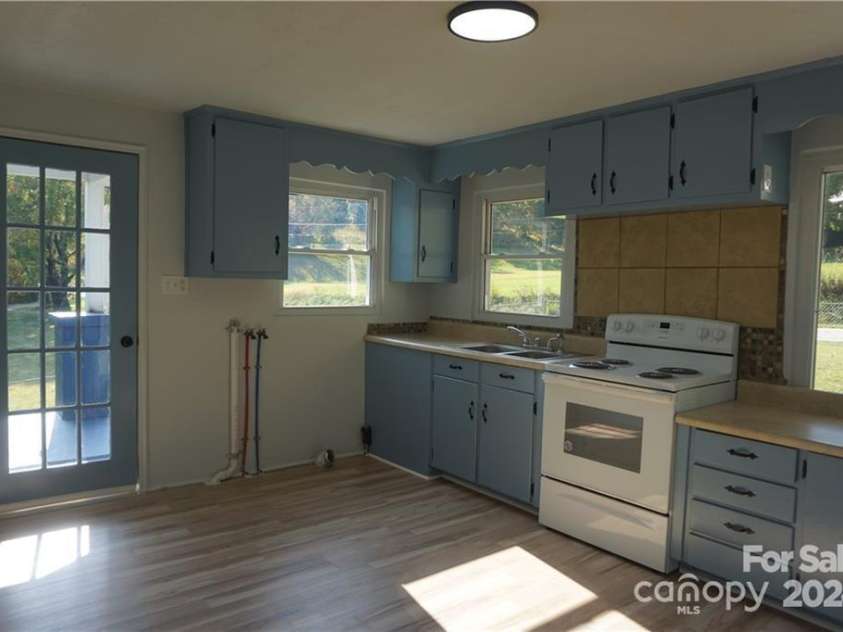 295 Merrills Cove Road, Asheville, NC 28803.  MLS# CAR4202644, YatesRealty ID 1954. 