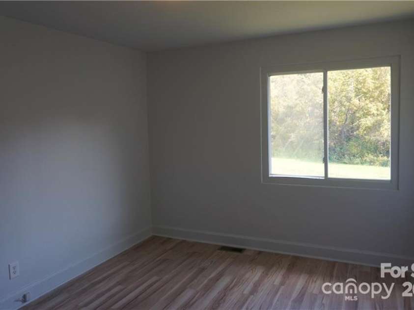 295 Merrills Cove Road, Asheville, NC 28803.  MLS# CAR4202644, YatesRealty ID 1954. 