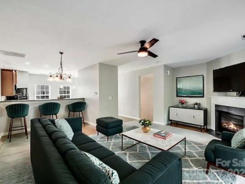 9800 Walkers Glen Drive, Concord, NC 28027.  MLS# CAR4265265, YatesRealty ID 19543. Living room virtually staged