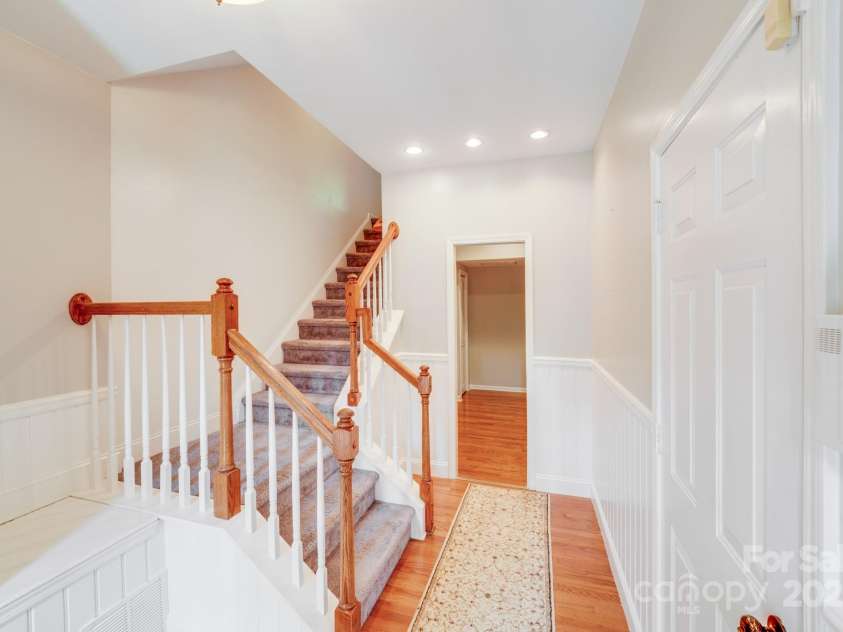 9800 Walkers Glen Drive, Concord, NC 28027.  MLS# CAR4265265, YatesRealty ID 19543. STAIRWAY TO MAIN FLOOR