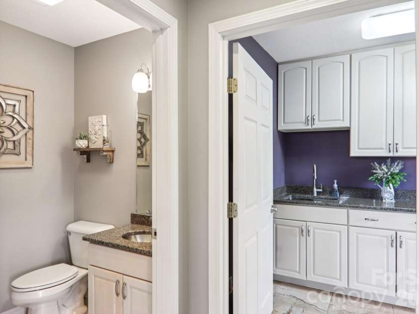 208 Buckeye Road, Maggie Valley, NC 28751.  MLS# CAR4372211, YatesRealty ID 19545. Half bath and laundry