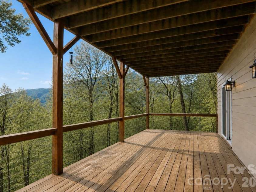 208 Buckeye Road, Maggie Valley, NC 28751.  MLS# CAR4372211, YatesRealty ID 19545. Lower level deck 