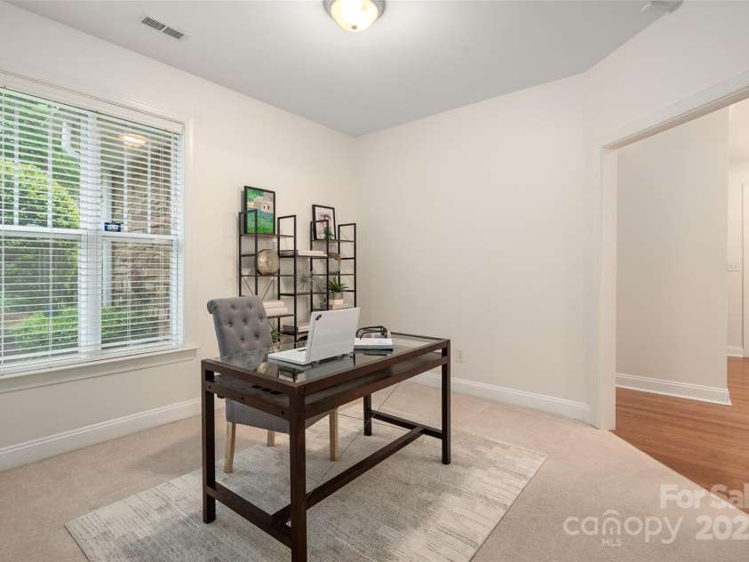 2941 Bellasera Way, Matthews, NC 28105.  MLS# CAR4226278, YatesRealty ID 19549. Nice sized office or flex space located just off the dining room and front entry.