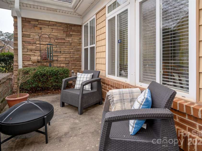 2941 Bellasera Way, Matthews, NC 28105.  MLS# CAR4226278, YatesRealty ID 19549. Spacious back patio—perfect for your grill and outdoor furniture!