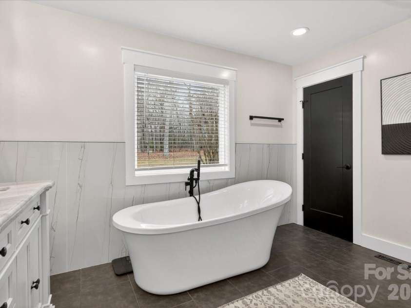 316 Wade Hampton Drive, Matthews, NC 28104.  MLS# CAR4337891, YatesRealty ID 19553. 