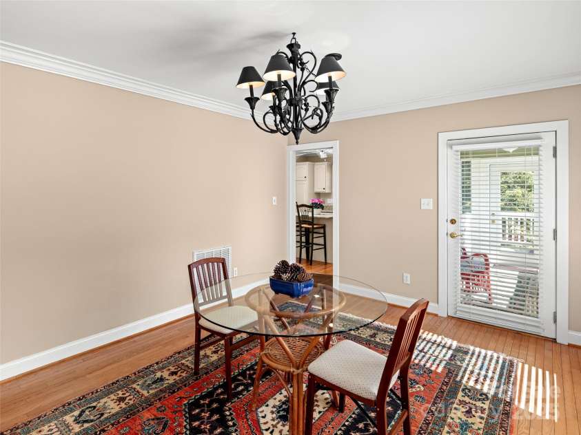 7 Creekside Way, Asheville, NC 28804.  MLS# CAR4228593, YatesRealty ID 19554. Dining Room looking into Kitchen and Sun Porch