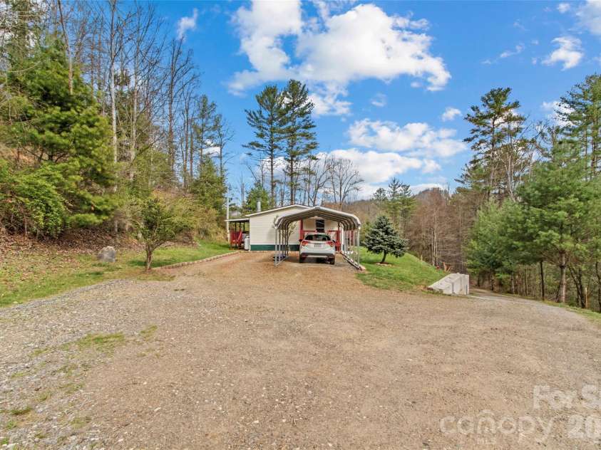 155 Thunderstruck Ridge, Burnsville, NC 28714.  MLS# CAR4365534, YatesRealty ID 19561. Carport