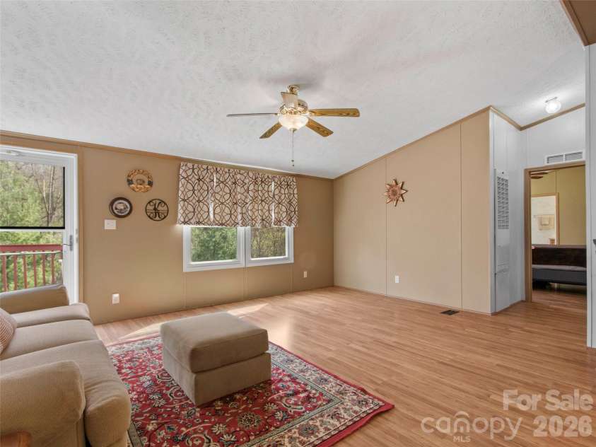 155 Thunderstruck Ridge, Burnsville, NC 28714.  MLS# CAR4365534, YatesRealty ID 19561. Living room