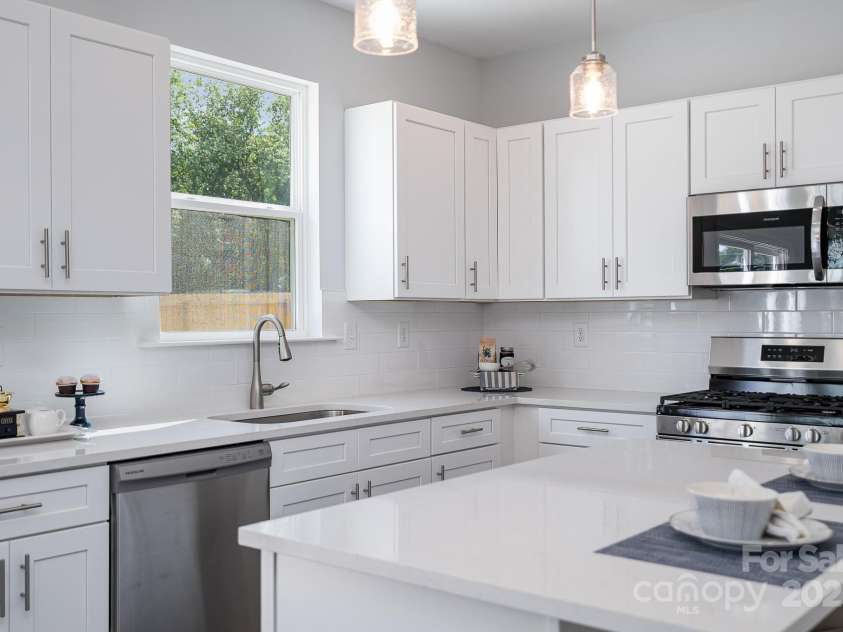 5116 Izzo Lane, Charlotte, NC 28214.  MLS# CAR4270987, YatesRealty ID 19564. Representational Photo - Staged