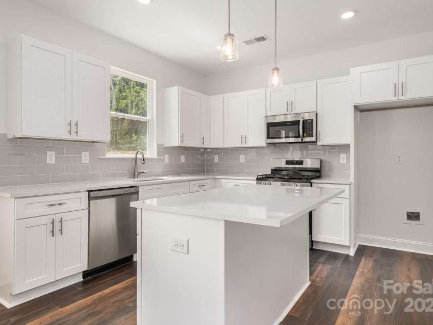5116 Izzo Lane, Charlotte, NC 28214.  MLS# CAR4270987, YatesRealty ID 19564. Representational Photo - Staged