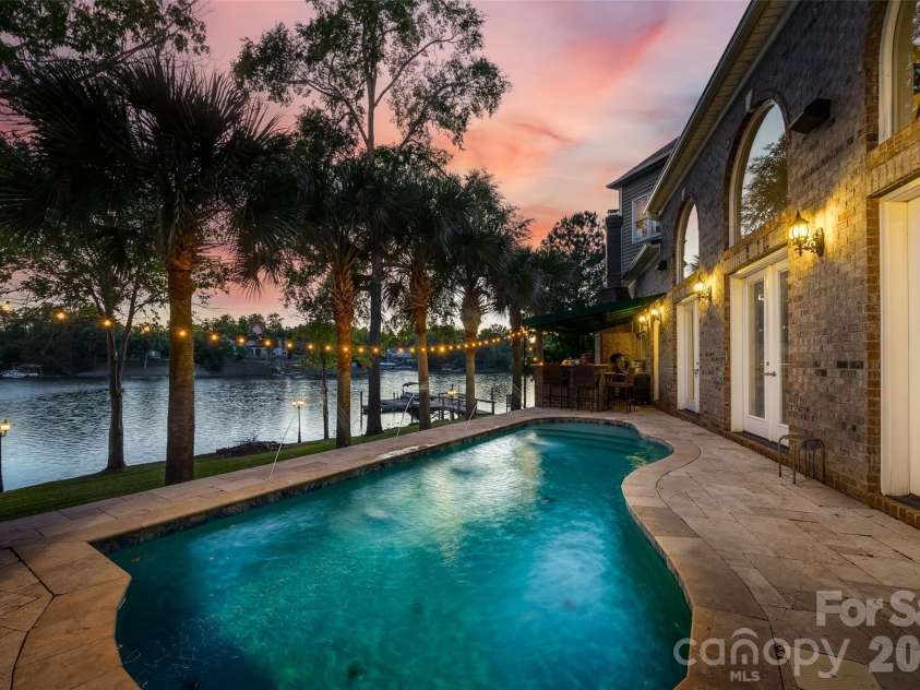 5650 Riverfront Road, Clover, SC 29710.  MLS# CAR4310458, YatesRealty ID 19574. Gunite Pool overlooking the lake