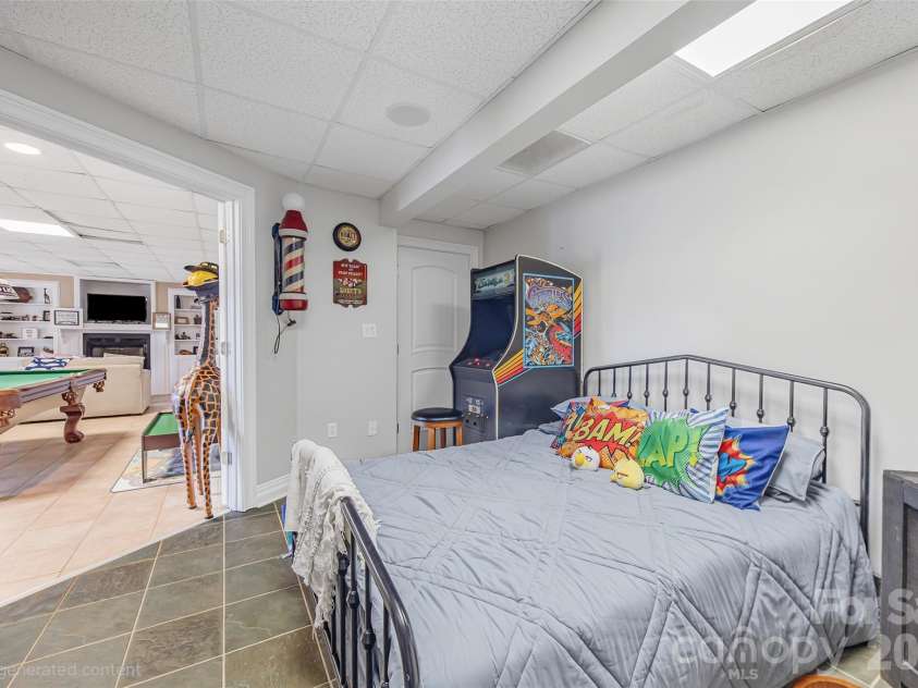5650 Riverfront Road, Clover, SC 29710.  MLS# CAR4310458, YatesRealty ID 19574. Main House - Lower Level Bedroom