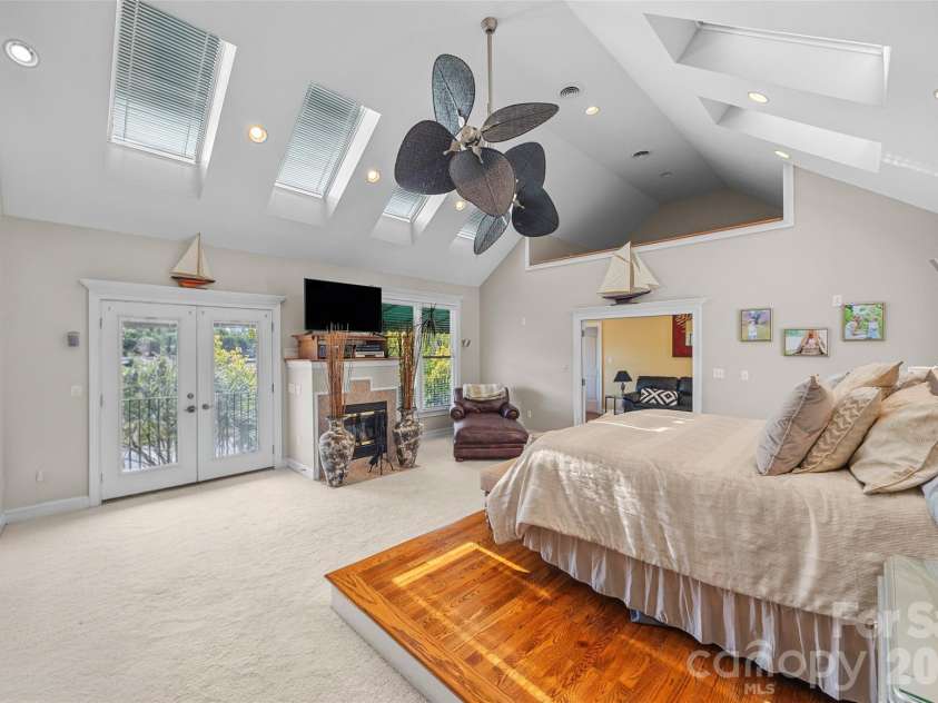 5650 Riverfront Road, Clover, SC 29710.  MLS# CAR4310458, YatesRealty ID 19574. Main House Primary Bedroom with private balcony