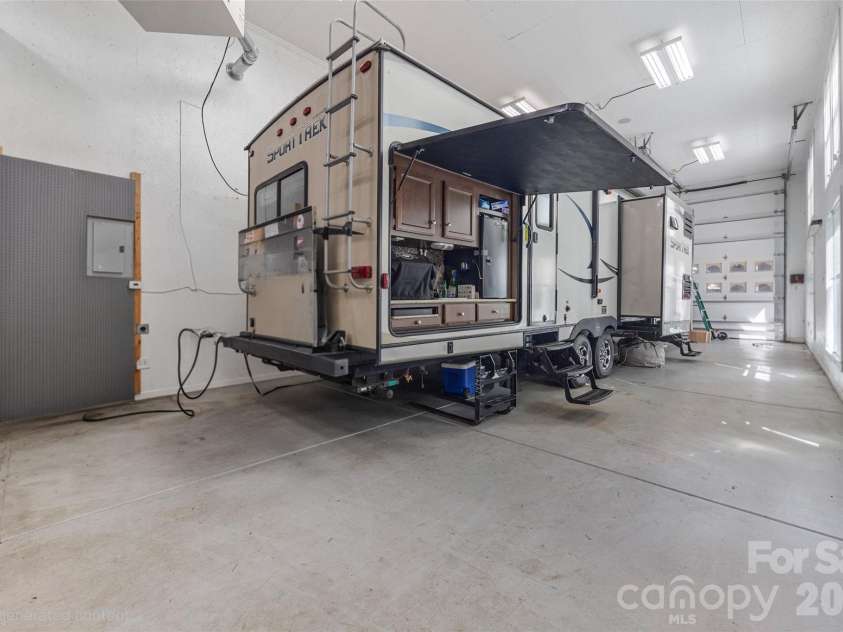 5650 Riverfront Road, Clover, SC 29710.  MLS# CAR4310458, YatesRealty ID 19574. RV/Boat garage connected to wing