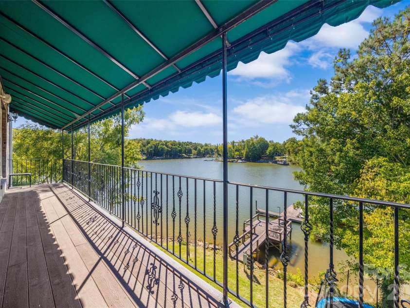5650 Riverfront Road, Clover, SC 29710.  MLS# CAR4310458, YatesRealty ID 19574. Wing - Balcony overlooking Lake Wylie