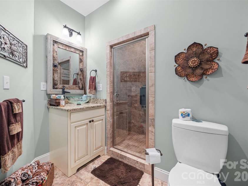 5650 Riverfront Road, Clover, SC 29710.  MLS# CAR4310458, YatesRealty ID 19574. Wing Full Bathroom with Sauna