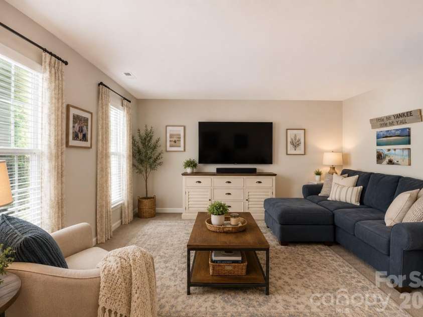 18503 The Commons Boulevard, Cornelius, NC 28031.  MLS# CAR4373801, YatesRealty ID 19576. Virtually staged family room