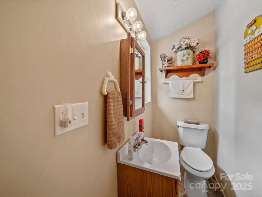 3509 Flint Drive, Statesville, NC 28677.  MLS# CAR4268969, YatesRealty ID 19579. Half Bath to Service Pool Area