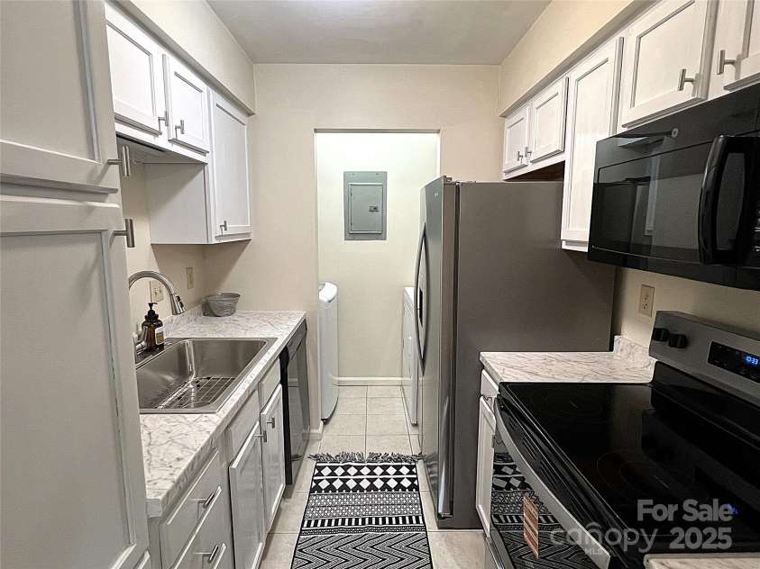 110 Heywood Road, Arden, NC 28704.  MLS# CAR4293209, YatesRealty ID 1958. Galley Kitchen 