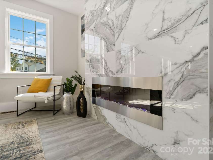 3008 Cricketeer Drive, Charlotte, NC 28216.  MLS# CAR4305520, YatesRealty ID 1958. Custom Electric Fireplace