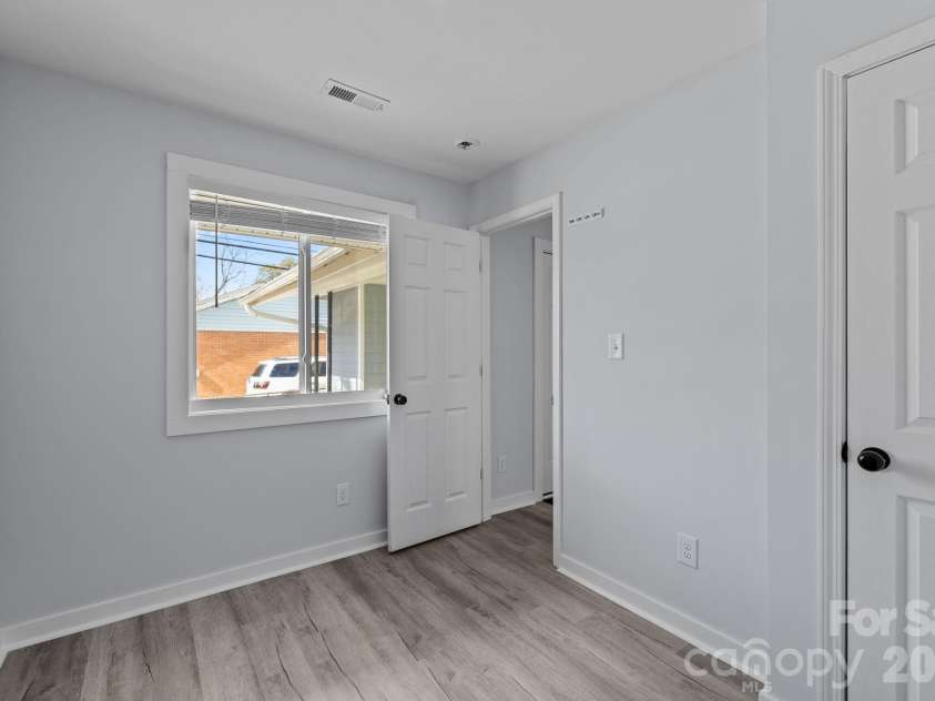 1008 Clanton Road, Charlotte, NC 28217.  MLS# CAR4370440, YatesRealty ID 19580. First Bedroom