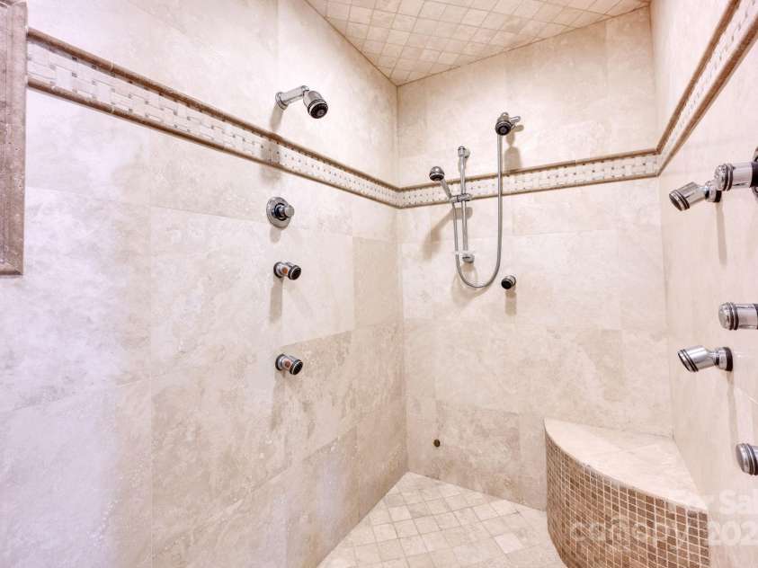 12932 Westmoreland Farm Road, Davidson, NC 28036.  MLS# CAR4243710, YatesRealty ID 19584. Amazing primary bath shower